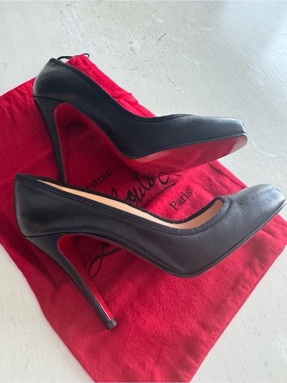 Christian Louboutin Black Leather Pumps with Red Sole